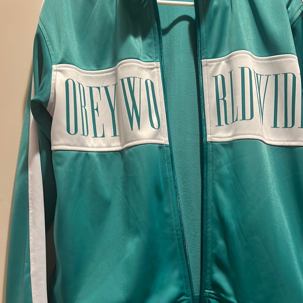off green Obey jacket, size small, almost new, Obey Worldwide logo